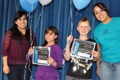 BGC Program Coordinator, Cassandra Sanchez (left) and BGC Mentor Coordinator, Lindsay Box (right) stand with Ashley Flores and Wyatt Ezell, both fourth graders in the 4+ category, at the Ignacio Elementary School on Thursday, March 5. 