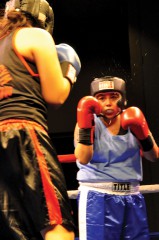Dominika Joy (in blue) of GB (Georgs & Brian’s) Boxing, from Ignacio meets her opponent, Leandra Toledo during the fourth bout of the ‘Boxing Is Back in the Rockies’ amateur’s card.