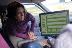 Eryka Thorley, a climate scientist working in NOAA’s Earth System Research Laboratory, Boulder, Colorado, uses equipment in NOAA’s mobile lab to check area methane levels in real time.