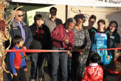 ELHI Association Chairman, Raymond Dunton cuts the ribbon, officially opening the ELHI Community Center on Friday, Oct. 30. Standing alongside Southern Ute Tribal Council, SCSYAC and Southern Ute Royalty members, as well as Ignacio Town Board members and ELHI board members. The ribbon cutting ceremony was followed by an open house. The new ELHI building was once the Ignacio Elementary building, and recently the Ignacio High School.