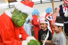 He’s not a mean one after all. The Grinch (Scott Allen) pays a visit to Academy students. 