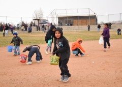 Families gather on the SunUte Community Center baseball field on Saturday, March 26 for the annual Easter egg hunt.