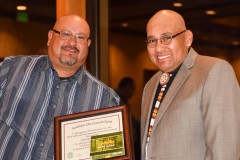 Steve Herrera (left) gives a smile with Bruce Valdez as he accepts his recognition of nomination for a Growth Fund safety award on Wednesday, March 2 at the DoubleTree by Hilton Hotel in Durango. 