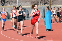 Ignacio Bobcats, Rachel Cooper keeps a steady pace on her second lap of the girls 1,600 meter race.