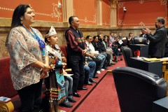 The Southern Ute Indian Tribe was recognized Thursday, March 17 in the Colorado State Senate Chambers in the Colorado State Capitol. Southern Ute representatives, Southern Ute Councilwoman, Amy Barry (left) and Tribal Chairman, Clement Frost (right) flank Little Miss Southern Ute Krystyn Weaver.