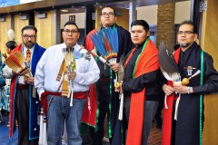 Afrem Wall (light blue shirt), took a photo with Headman of the 4 Corners Gourd Society, Jack Frost Jr. (far right) and sons Hunter Frost and Jack Frost III, during the Hozhoni Days Powwow at Fort Lewis College, April 15 and 16 in Whalen Gym. 