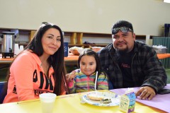 Head Start students and their families enjoyed a morning meal of eggs, fruit, bagels, and milk. 