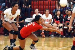 Graduated Ignacio senior Chrystianne Valdez goes low along IHS Gymnasium's floor to come up with a ball during the Fall 2015 season. Valdez will be taking her game to NCAA Division II Fort Lewis College.