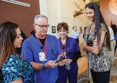 The Southern Ute Health Center’s nursing group admires their award.