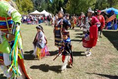 Little head boy dancer and tribal youth, Aeden Richards walked in during grand entry on Saturday, Sept. 24. Jr. Miss Southern Ute Alexandria Roubideaux was also in attendance.