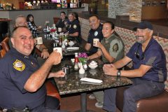 Southern Ute justice and Regulatory officers, rangers and staff sit together for the ‘Coffee With A Cop’ event hosted by SUPD at the Sky Ute Casino Resort Friday, Oct. 7.