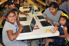 Families enjoyed sharing computer time, playing games and taking photos together during the Computer Portion of Ignacio Elementary Family Night.