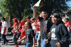 Middle School volleyball and football teams show team spirit at the Ignacio Homecoming Parade on Oct. 7.
