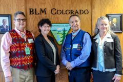 Southern Ute Tribal Council reps. Treasurer James M. Olguin and Chairman Clement J. Frost pose for a photo with Assistant Secretary for Land and Minerals Management, Janice Schneider and BLM State Director Ruth Belch after signing an agreement settling fracking rule litigation in Lakewood, Colo. Friday, Nov. 4. 