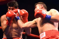 Juan Bladimir Hernandez (right) sticks La Plata County local Elco Garcia with an uppercut during the “Fright Night” main event. The relatively-unknown fighter from Mexico would leave Ignacio’s Sky Ute Casino Resort Events Center with a sixth-round TKO victory.