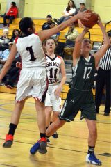 Ignacio’s Makayla Howell (1) measures perfectly a block of Ridgway’s Anza Connaughton (12) during SJBL action inside SunUte Community Center on Saturday, Feb. 11.
