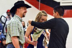 With father Brandon Pearson, left, enjoying the moment, Heile Pearson receives her Sophomore Royalty sash from Clay Seibel. She is the daughter of Brandon and Kara Pearson, and he the son of Shane and Melanie Seibel.