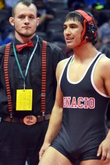 Seen before a match inside Pepsi Center last season, Ignacio senior Lorenzo Pena (right) and head coach Jordan Larsen will return again the weekend of Feb. 16-18, 2017, to seek a State Championship. Pena will compete at 160 pounds.