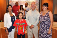 Marcus White (red ribbon shirt) accepted the Elbert J. Floyd on behalf of his cousin, Kaya Bison. White stands with his mother, Agatha Bison, along with presenter, John L. Floyd, Southern Ute Education Director, LaTitia Taylor, and Southern Ute Tribal Councilmembers Alex Cloud, Lorelei Cloud and Tyson Thompson.