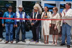 Ernest House Jr., Executive Director of the Colorado Commission of Indian Affairs cuts the ribbon during the Ute Indian Museum’s grand reopening on Saturday, June 10 in Montose, Colo. alongside dignitaries from the Ute tribes and the State of Colorado. The newly redesigned cultural center boasts culturally influenced architecture, with expanded exhibit spaces to highlight contemporary Ute culture alongside historical Ute heritage. 