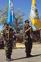 Southern Ute and Navy veteran Rudley Weaver, (left) and Ute Mountain Ute USMC veteran Gordon Hammond, carry their respective tribal flags during the 4th of July celebration parade in Ft. Duchesne, Utah on Saturday, July 1. The veterans won in the Veterans category of the parade.