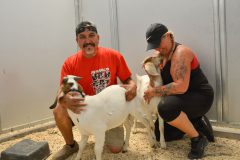 Kenneth “Mossy” Peña and Shasta Peña take a photo with their winning goats. They took home first place in the Weather and Billy category. 