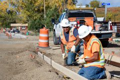 Sidewalk construction is underway for the County Road 517 improvement project bordering Southern Ute Tribal campus. Construction workers with Crossfire LLC, work diligently, building forms and pouring concrete ahead of the winter season, Friday, Oct 6.  