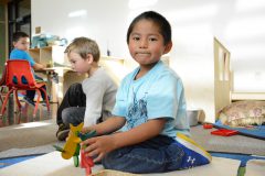 Southern Ute Head Start student, John Scott smiles in his new class setting, Friday, Dec. 1; temporary classrooms are now located at the Southern Ute Cultural Center. Head Start students were relocated to the Cultural Center, prompted by potential health concerns, recently identified in the former Head Start building. 