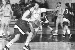 20 Years Ago: Bayfield Wolverine Brandi Naranjo stands her ground as Bobcat Stacy Simons drive the lane toward the Ignacio basket Tuesday, January 13 in Bayfield. 
This photo first appeared in the Jan. 16, 1998, edition of The Southern Ute Drum.
