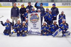 The Durango Steamers take center ice for a post game team photo with their hard earned second place Mt. Lincoln League Tourney banner.