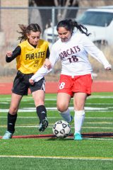 Ignacio Girls Soccer player Jazmin Carmenoros (18) gets the ball and heads down field trying to keep Pirates player number 3 from taking it when the Ignacio Girls Soccer played the Pagosa Pirates on Tuesday, March 20.