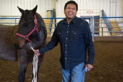 Owner of “Shunka Wakxan Equine Assisted Learning and Healing”, Ryan White and gelding “Pablo” stand together after the free two-hour trauma based demonstration on Saturday, April 7, at the Sky Ute Fairgrounds. 