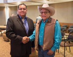 Chairman of the Ute Mountain Ute Tribe, Harold Cuthair (right), congratulates recently elected Southern Ute Councilman Melvin J. Baker following the certification of votes on Monday, April, 23 in Ignacio, Colo. Baker will be serving his fourth term as a member of the Southern Ute Tribal Council and is no stranger to politics.