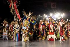 Head Dancers stand together for the Victory Song as the gathering of Nations powwow comes to a close on Saturday night, April 28 — Albuquerque, N.M. 