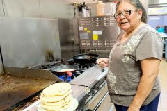 Helen Munoz makes fresh bread and accepts the title of “Best Tortilla Maker” for the Sip, Chat and Chew elder’s luncheon. 