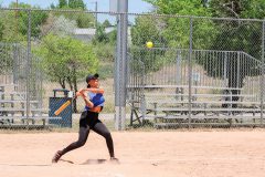 Tasha Herrera gets ready to slam the softball while playing in the Los Pinos Softball Tournament Saturday, May 26