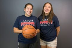 Basketball all-stars, Avionne (right) and Ebonee Gomez (left) stand together for a portrait. The two girls headed to an international basketball competition in Australia, Monday, July 16, as part of the ten-day Down Under Sports program, which fosters sportsmanship and cultural exchange among athletes. 