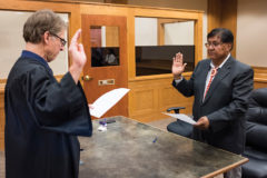 Interim Chief Judge, Paul Whistler, oversees the swearing-in of Southern Ute tribal elder, Byron Frost to the Gaming Commission at the Southern Ute Tribal Courts, Tuesday, Sept. 11. This will be Frost’s second time serving on the Commission. Also taking oaths for their seats on the Gaming Commission were Esther Rima and Lark Goodtracks.