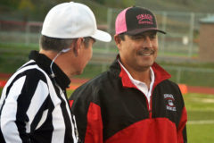 Ignacio Football head coach ‘Ponch’ Garcia discusses matters with an official prior to the Bobcats’ home game versus Center earlier this season. He regretted to inform the media that IHS’ Oct. 19 win over Dolores will be the team’s last game; Ignacio will be forfeiting the scheduled Oct. 26 season finale to Centauri.