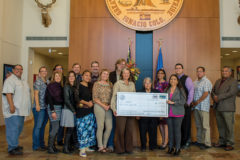 On Thursday, Nov. 1 the Southern Ute Tribal Council hands over a one-million dollar check to KSUT for their capital campaign match. The match came after KSUT raised the $1-Million to build the new Eddie Box Jr. Media Center which will be located south of the current KSUT studios. Southern Ute Tribal Council, KSUT staff and board members were present for the ceremonial handing over of the check.