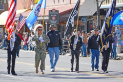 Members of the Southern Veterans Association, Raymond Baker (second from left) carrying the Southern Ute Tribal flag, Howard Richards Sr., (center) and Rod Grove (second from right) lead the annual Durango Veterans Parade on Veteran’s Day, Sunday, Nov. 11.