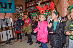 The KSUT radio station welcomed a cheerful visit by the Southern Ute Indian Montessori Academy (SUIMA) students, who serenaded them with Christmas songs sung in Ute.
