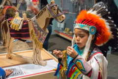 Southern Ute Brave, Levi Lopez is one of the first to interact and view the newly opened “Written on the Land” Ute exhibit on Friday, Dec. 7. 

