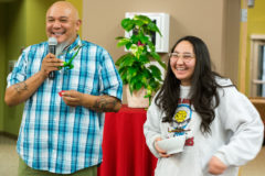Edward Box III and Jazmine Carmenoros pull out raffle tickets and handout prizes during the Elder Celebration dinner on Monday, Jan. 14 in the Southern Ute Multi-Purpose Facility. 