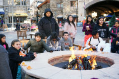 Southern Ute and Ute Mountain Ute kids listening to stories of Ute People at the Telluride ski resort during a recent field trip organized by the two tribe’s respective recreation departments, Saturday, Dec. 15. The youth participated in snowboarding lessons, ice skating and evening social activities with their peers throughout the weekend in Telluride, Colo. 