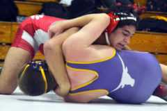 Ignacio’s Dustin Sanchez turns over Basalt’s Ryan Borchelt, en route to a first-period pin at Paonia’s Screaming Eagle Invitational Saturday, Jan. 26.