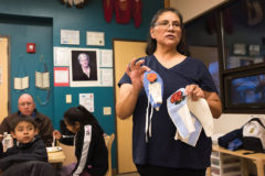 The theme for February’s workshop was moccasin making, a class led by Southern Ute elder Elise Redd. Parents guided the youth in tracing their feet on paper, to create templates for the leather soles. 
