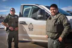 Southern Ute Tribal Rangers, Corporal Simon Spencer (left) and Tribal Ranger Jesse Vigil stand alongside one of the department’s heavy-duty trucks. The Rangers patrol every corner of the Southern Ute Reservation in their mission to protect its natural resources.