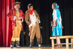 Gaston (Bird Red) and Lefou (Elco Garcia Jr.) mock Belle (Makayla Peterson) during the production of “Beauty and the Beast” on Thursday, April 18 at the Ignacio High School Auditorium. 
