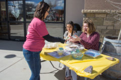 “For the Children Powwow” volunteers, Jerrika Rarick and Elisia Cruz set up a table full of baked goods to raise money on Thursday, March 28. All funds raised were used to sponsor the powwow on Saturday, April 6. 


